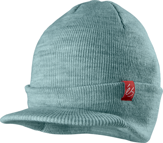 Penny Visor Beanie made from 100% acrylic with a ribbed design and a red logo tag on the brim.